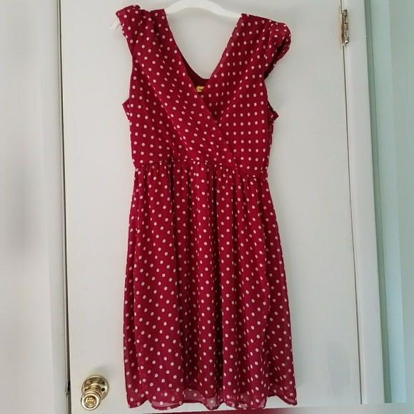 yellow dress with red polka dots